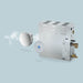 Mr. Steam boiler with steam outlet, sleek stainless steel body, featuring a round control panel.