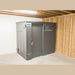 Swisher 9 Person ESP Safety Shelter, gray metal design with double door for secure access.