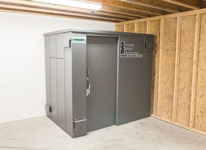 Swisher 9 Person ESP Safety Shelter, gray metal design with double door for secure access.
