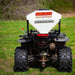 Swisher Commercial Pro ATV Spreader rear view, white hopper with black frame and large tires.