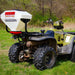 Swisher Commercial Pro ATV Spreader, white hopper on ATV with rugged tires, angled view.