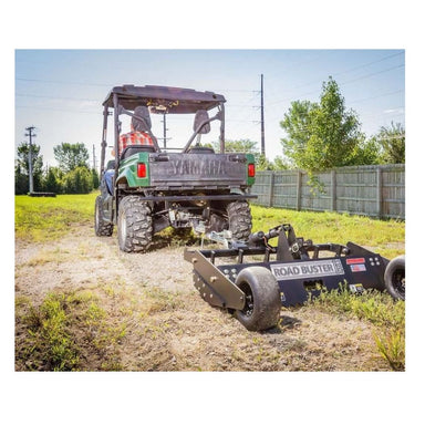 Swisher Commercial Pro RoadBuster Driveway Grader, black with large wheels and adjustable hitch.