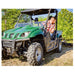 Swisher Commercial Pro RoadBuster Driveway Grader attached to green utility vehicle, showcasing heavy-duty wheels.