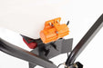 Swisher Commercial Pro UTV/Truck Spreader, black with orange vibrator, side view showing mounting features.