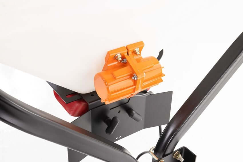 Swisher Commercial Pro UTV/Truck Spreader, black with orange vibrator, side view showing mounting features.
