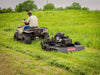 Swisher Country Cut 44" Rough Cut Mower, angled view, black with powerful Kawasaki engine and wheels.
