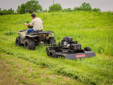 Swisher Country Cut 44" Rough Cut Mower, angled view, black with powerful Kawasaki engine and wheels.