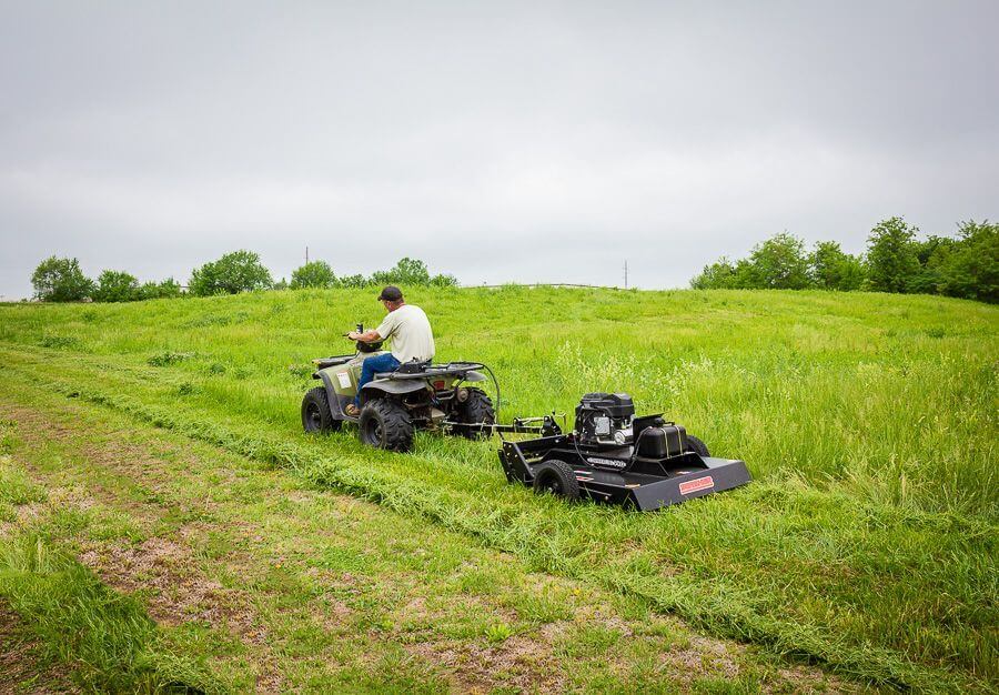Swisher Country Cut 44" Rough Cut Mower, black with 14.5 HP Kawasaki engine and wheels.