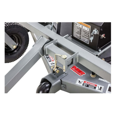 Swisher Fast Finish 60" Commercial Pro Mower close-up view with gray frame, wheels, and safety labels.