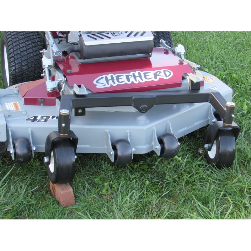 Shepherd Walk-Behind Lawn Mower angled view, featuring red and gray finish with durable wheels.
