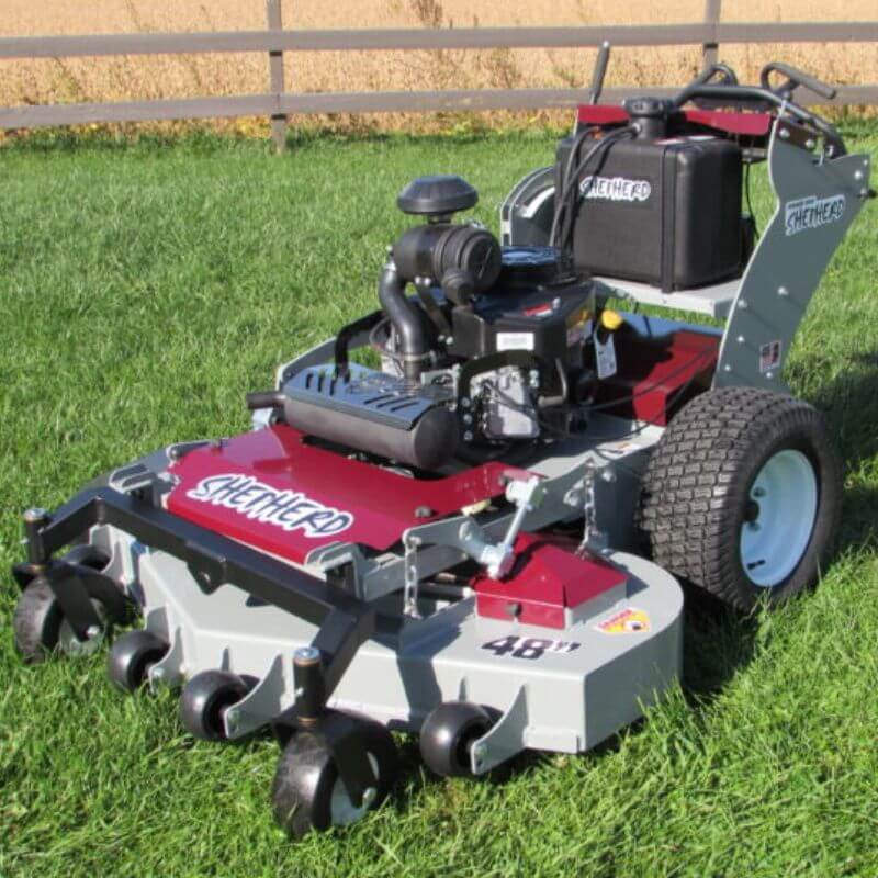 Shepherd Walk-Behind Lawn Mower, angled view, featuring a red and silver design with large wheels.
