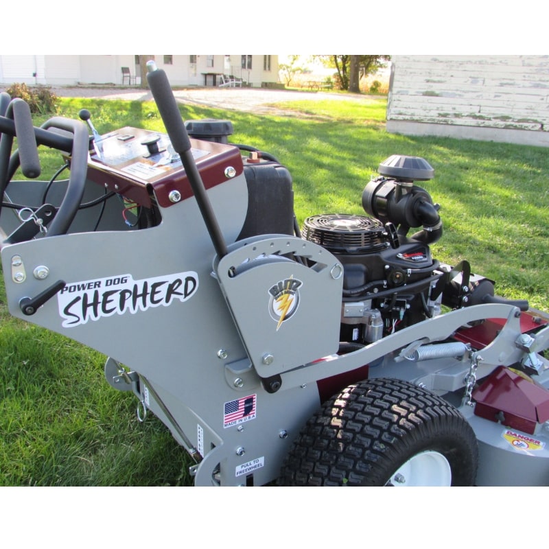 Power Dog Shepherd walk-behind lawn mower in gray and maroon with dual handles and large wheels.