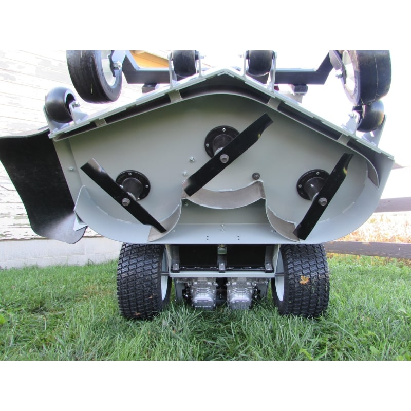 Walk-Behind Lawn Mower Shepherd Power Dog underside view with three blades and sturdy wheels.