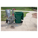 Dosko brush chipper positioned beside cleanup containers