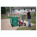 Dosko 4-inch chipper discharging chips into yard cart
