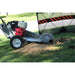 Dosko 337 Honda GX390 stump grinder side view with wood chips and side-discharge frame