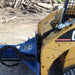 Iron & Oak SMH2419 skid steer log splitter mounted on skid steer