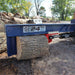 Iron & Oak SMH2419 skid steer log splitter in-use side view