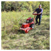 Maxim MBC190H brush cutter clearing tall grass in use