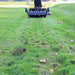 Maxim tow-behind plug aerator soil plugs after aeration