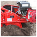 Maxim RMT55H commercial tiller engine and transmission in soil