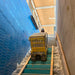 Movex TT-66 tracked stair carrier moving a crate up stairs