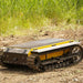 Movex XC-48 all-terrain carrier muddy trail side view