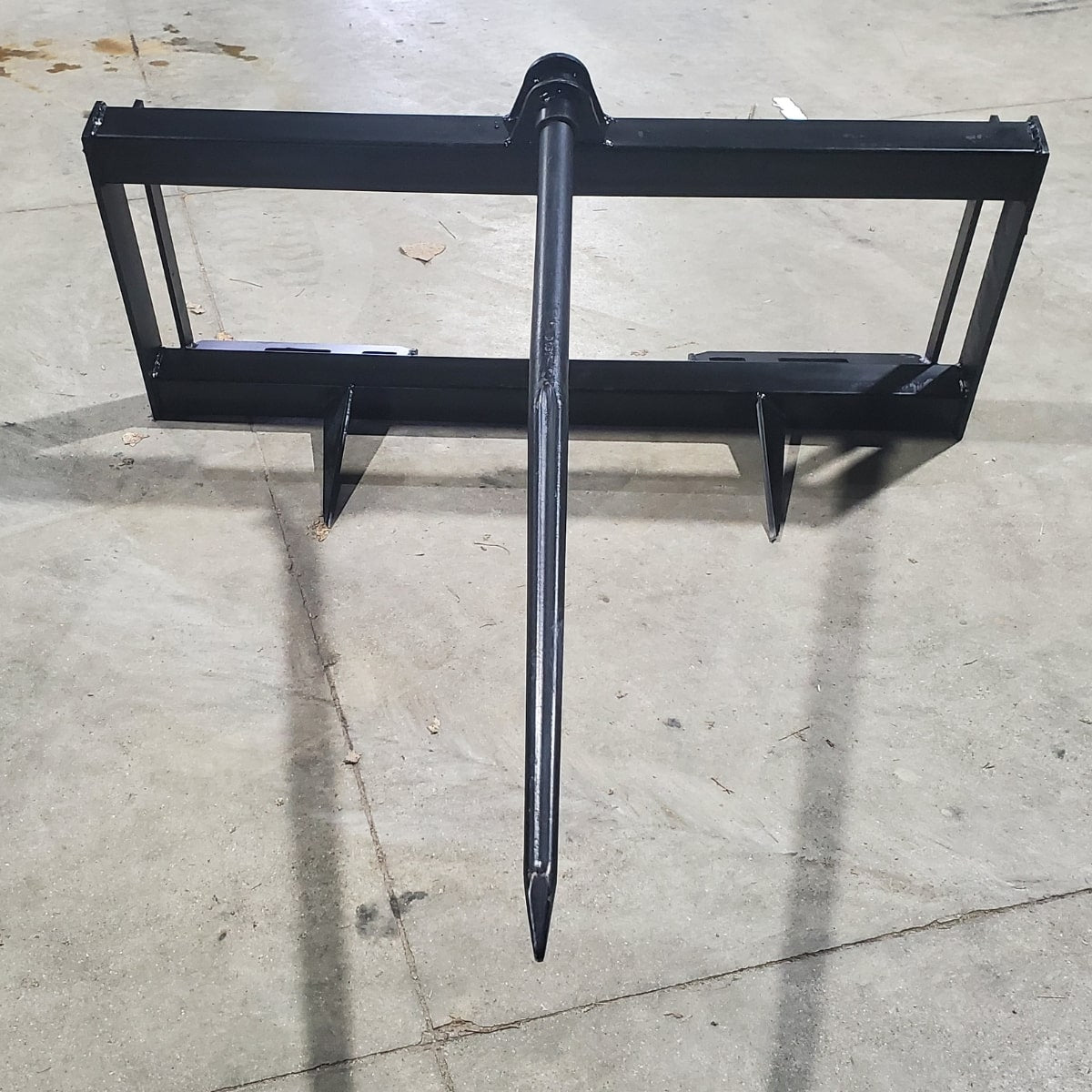 Storm Attachments Single Hay Bale Spear Attachment Front View